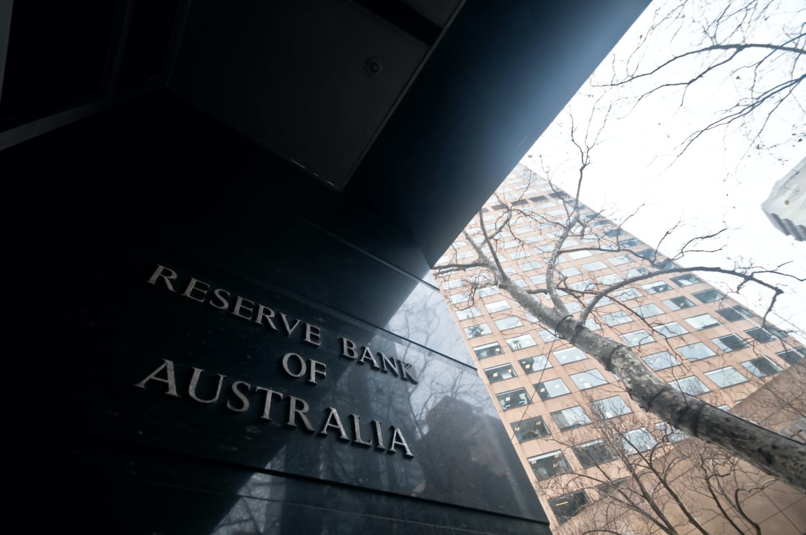 RBA holds interest rate at record low 0.1 per cent, purchases extra $100 billion of bonds