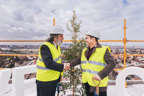 L-R: Jim Moschyiannis and Thomas Chiu Footscray's first Live City development tops out
