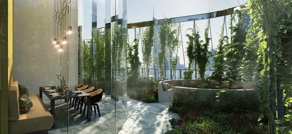 An outdoor garden terrace with indoor dining and lounge space. Premier Tower amenities