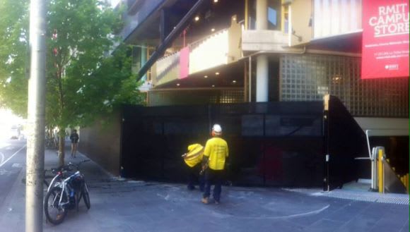 Hoarding going up on site. Image courtesy of MvS Architects Work begins on RMIT's New Academic Street Project