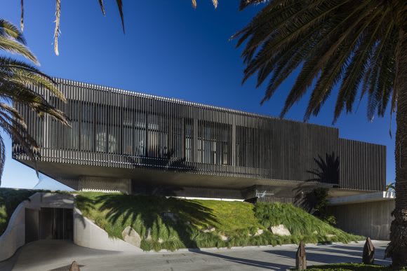 The Stokehouse appears to float above the sand dunes. Image: Supplied St Kilda foreshore's Stokehouse reborn