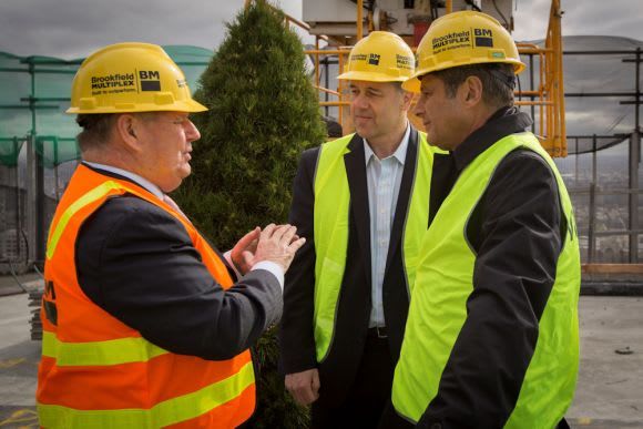 Lord Major Robert Doyle with Cbus's Steve Bracks and Adrian Pozzo. Image: supplied 35 Spring Street marks its place in the skyline
