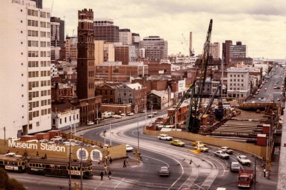 La Trobe Street with Museum, now Melbourne Central, station under construction in 1975 - image: PRO Demolition on Port Phillip Arcade signals start of major works on the new Town Hall station
