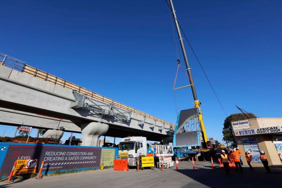 The new Noble Park station canopy being lifted - image LXRA New station canopy and escalators appear at Noble Park