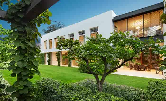 18 car home garage? Malvern Alan Powell-designed trophy home for sale