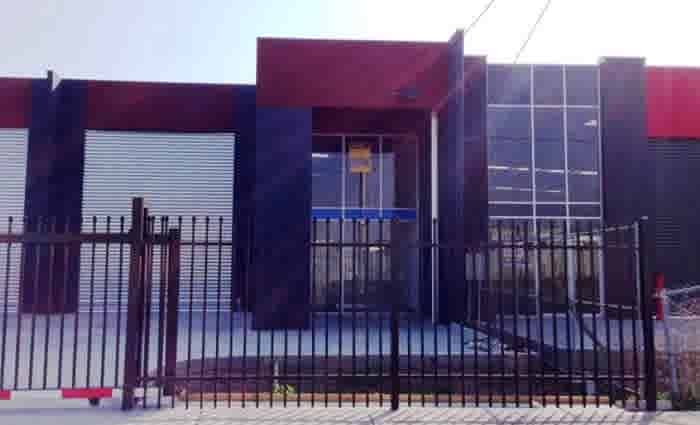 Affordable warehouse on the market via Raine & Horne in Victoria's Sunshine North