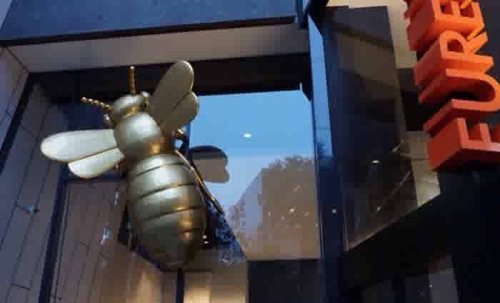 Melbourne's Eureka Tower gets illuminated golden bees in new Richard Stringer public art installation