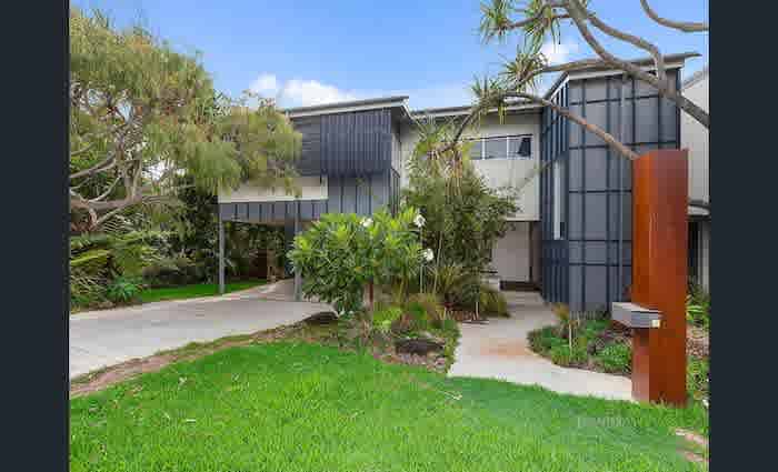 NZ media boss lists Sunshine Coast holiday home
