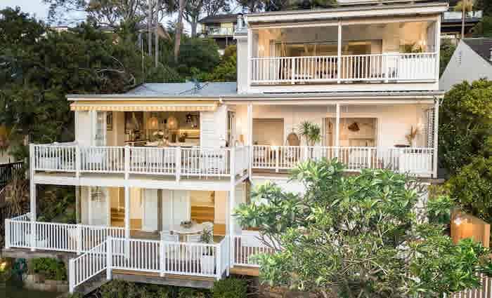 Waterfront Newport trophy home with boathouse listed