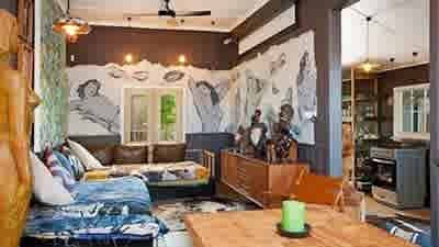 Artist David Bromley knocks $150,000 off his Byron Bay asking price
