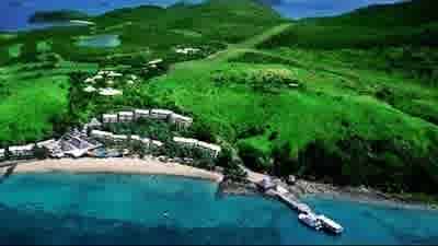 Chinese mining tycoon beats Clive Palmer to acquire Lindeman Island, with plans to redevelop
