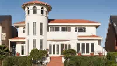 Mediterranean beachfront mansion in Tennyson on the market