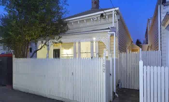 Injured AFL Roo Daniel Wells sells Port Melbourne cottage to Cat rival