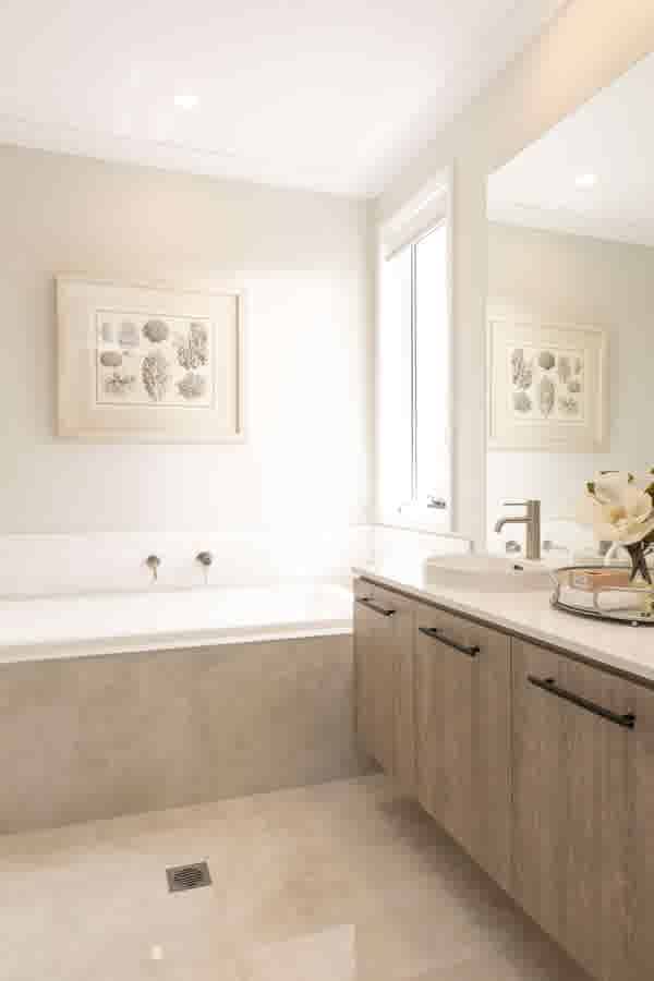 Style break in the bathroom with Plantation Homes