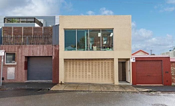 Scooter hire company sign North Melbourne tenancy