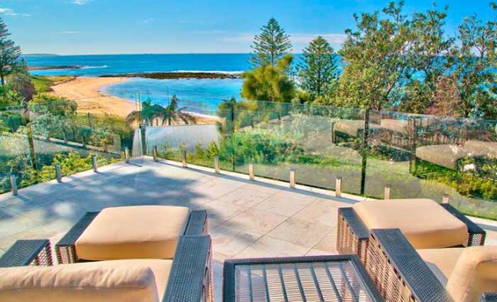 NRMA chief Rohan Lund buys Toowoon Bay weekender