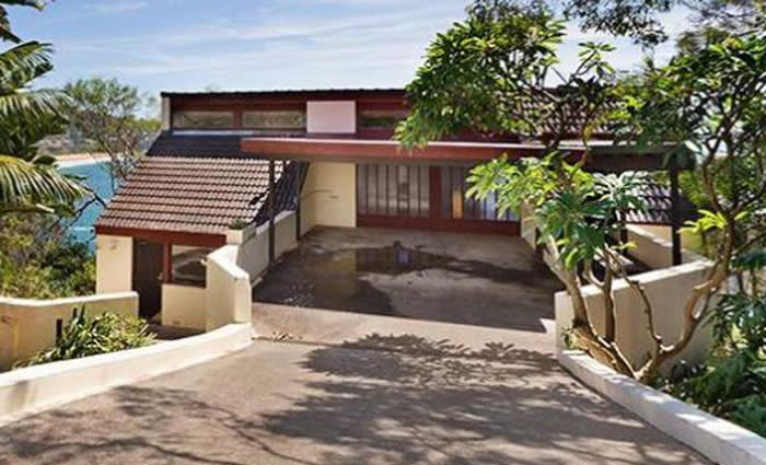 Donald Trump's manufacturing fixer Andrew Liveris lists at Whale Beach