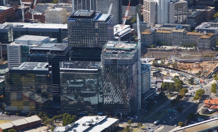Multiplex tops out final commercial office tower at Collins Square