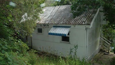 Cockroach-free Church Point waterfront cottage on the market