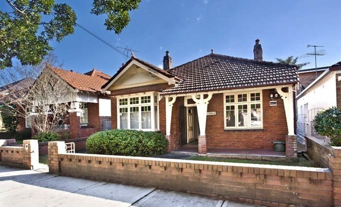 Bids aplenty as rain buckets down on Sydney weekend auctions