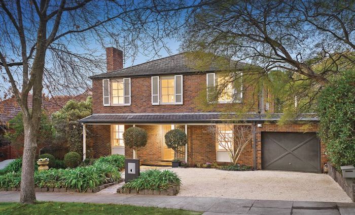 Former AFL coach Brad Scott buys Kooyong family home