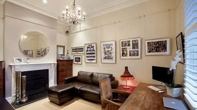 Geelong boss Brian Cook's Albert Park terrace sells post-auction