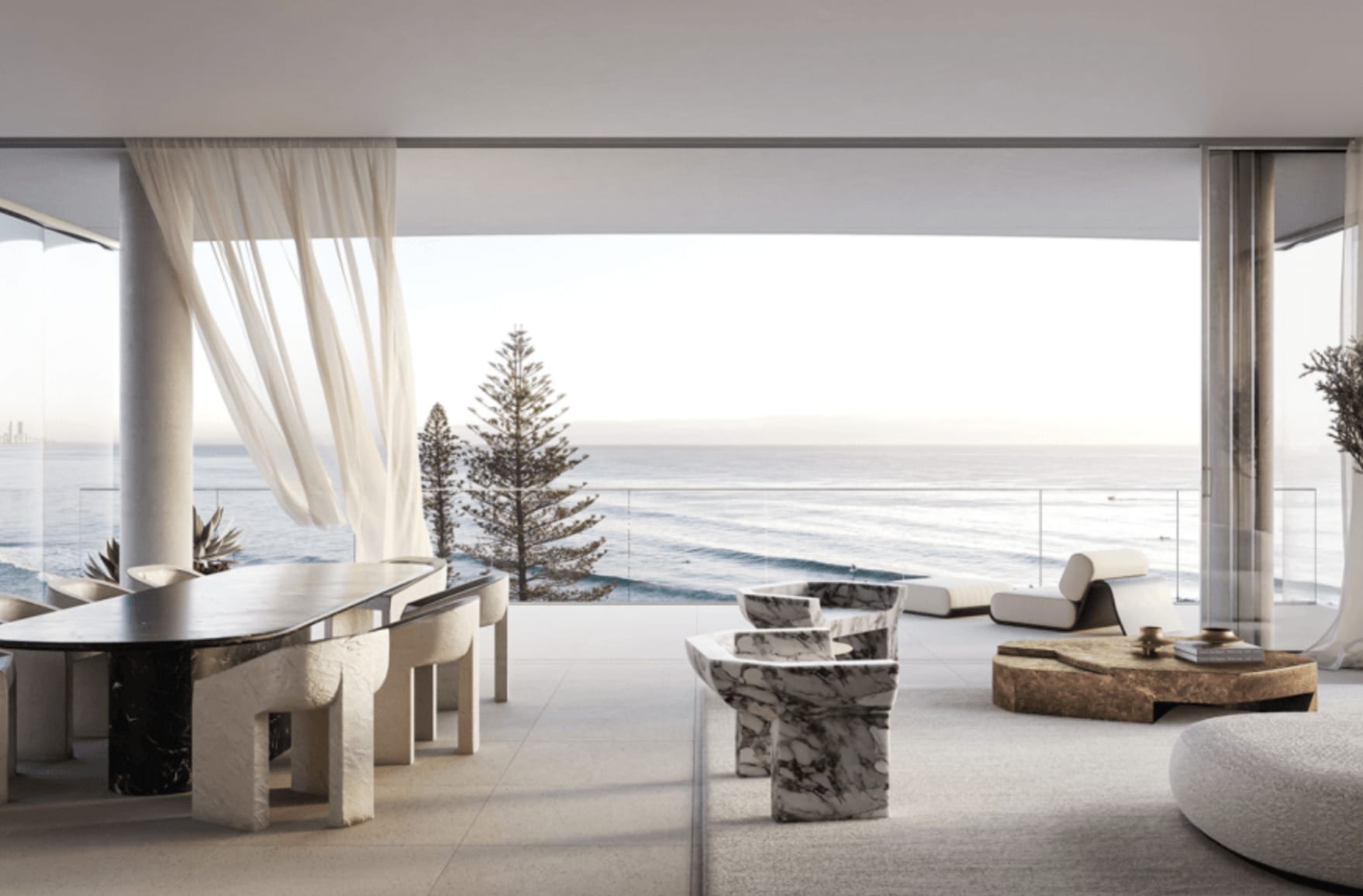 The luxury living space opening to the balcony with Burleigh backdrop. Image supplied