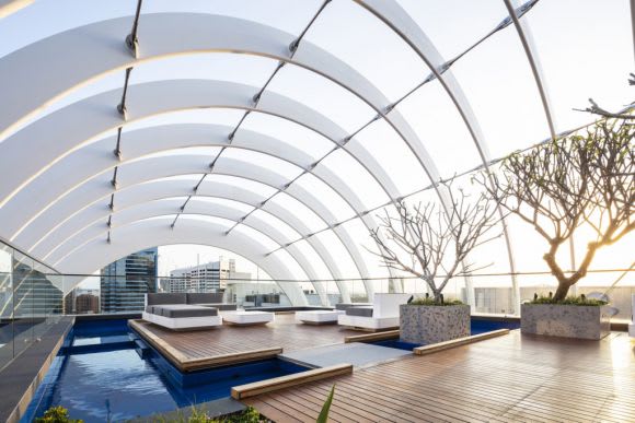 Arc by Crown's outdoor pool during the day Love holidays? Here's the next best thing: 12 of Australia's best apartment pools
