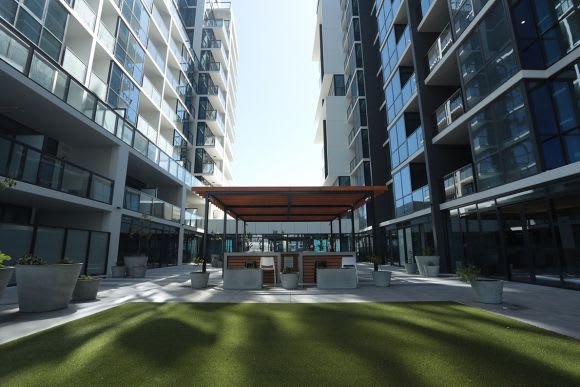 The towers sit atop a landscaped podium. Image: Supplied Residents prepare to move into first stage of Greaton's West Franklin development