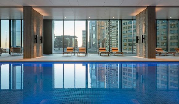 Collins Place creates an external backdrop to the pool deck 35 Spring Street becomes one of Melbourne's premier apartment developments