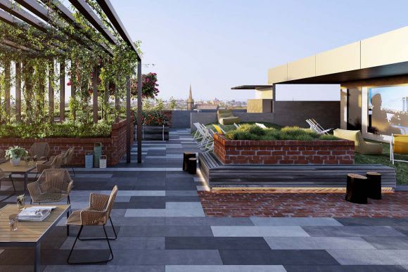 Recycled bricks frame the rooftop area. Image courtesy SPEC Property Trilby Apartments a reflection of its target market