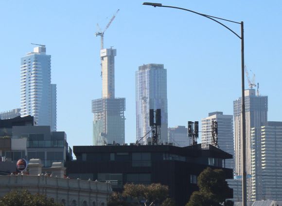 Light House stands centre of shot The May CBD development wrap