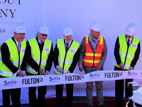 The obligatory cutting of the ribbon Fulton Lane on show during its topping out ceremony