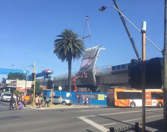 Station canopy modules have begun to appear one stop down the line at Murrumbeena - image: LXRA Carnegie's apartment scene in focus