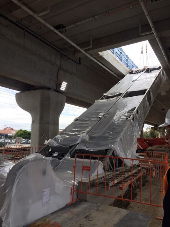 Escalators have been moved into place to allow access to the elevated station - image LXRA New station canopy and escalators appear at Noble Park