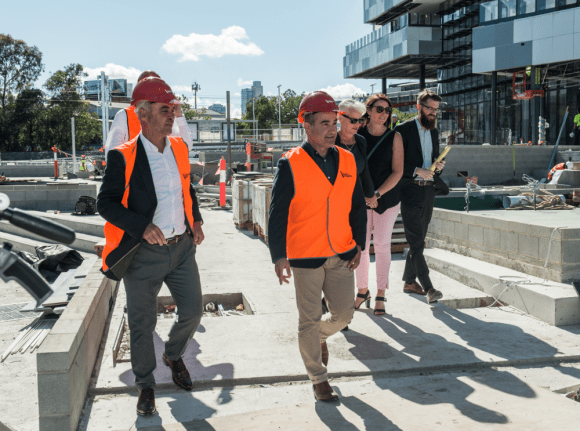 Lead architect Richard Leonard from Hayball and the Deputy Premier tour the SMPS site. Image: Henry Lam, Hayball South Melbourne Primary School set to open for Term 1