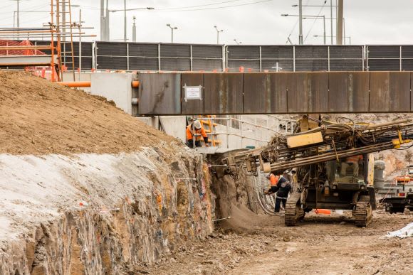 A new cutting for the eastern side of South Morang station, image - LXRA Level Crossing Removals steaming through Spring school holidays