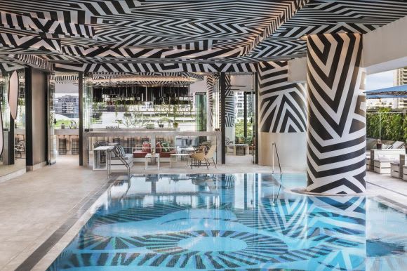 The zebra patterned pool Brisbane stepping into its own as a tropical hotel destination