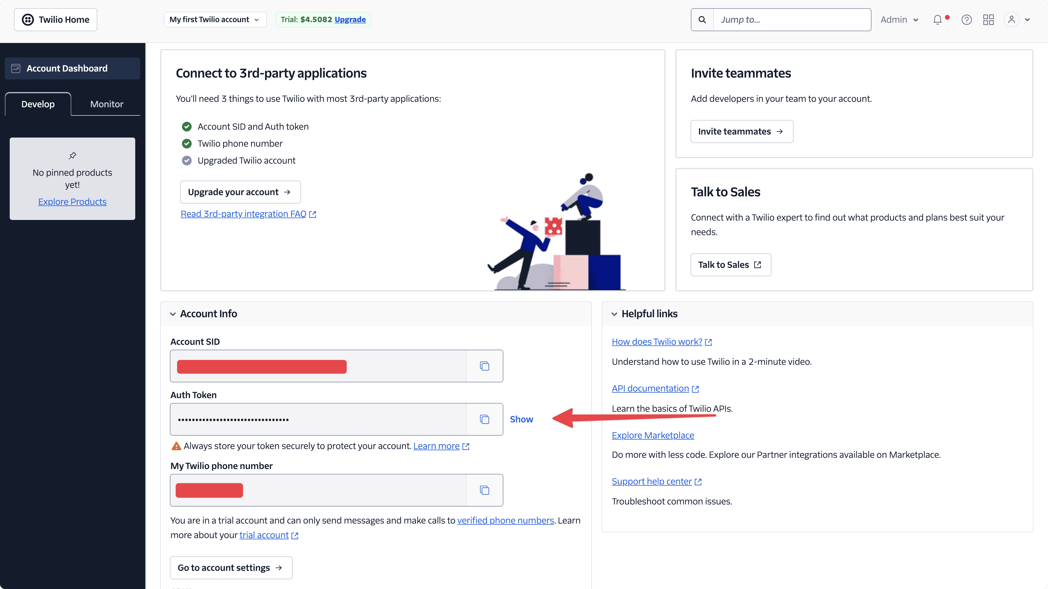 Twilio console homepage showing the account SID, phone number, and auth token