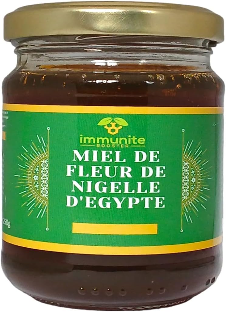 Pot de miel de fleur de nigelle avec une cuillère à miel