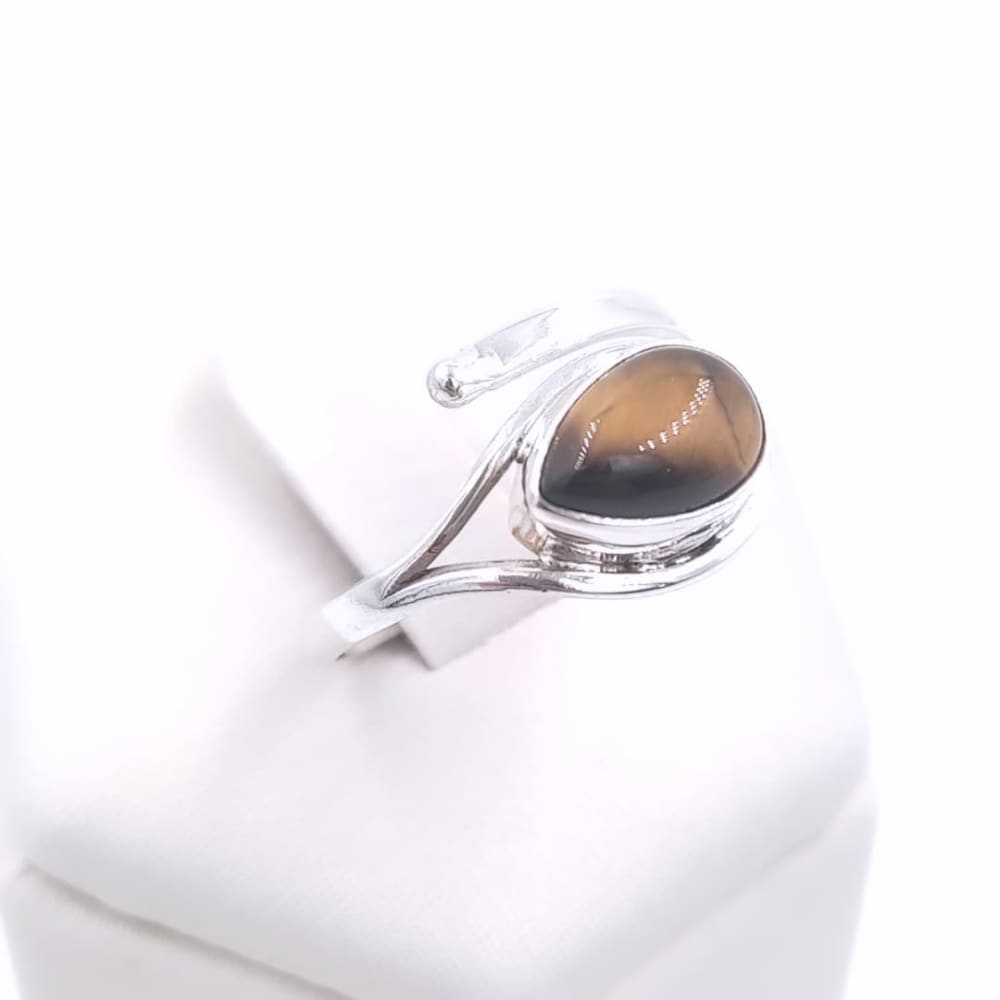 ANILLO SEMI ABIERTO ÓNIX Y OJO DE TIGRE.