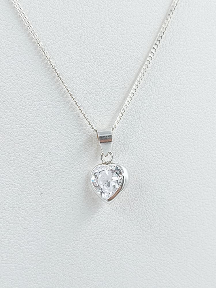 DIJE CORAZÓN PUNTO LUZ