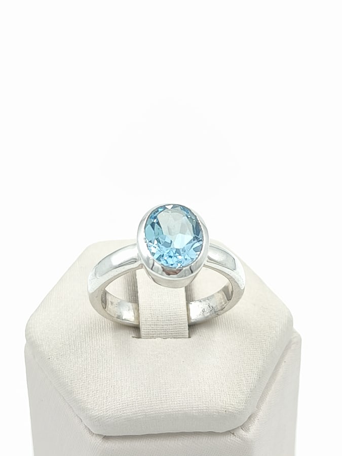 ANILLO CON TOPACIO AZUL