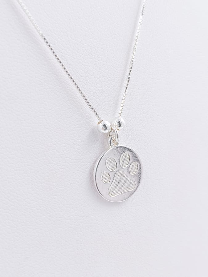 CONJUNTO MEDALLA CON HUELLA
