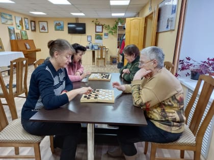 Турнир по шашкам и шахматам