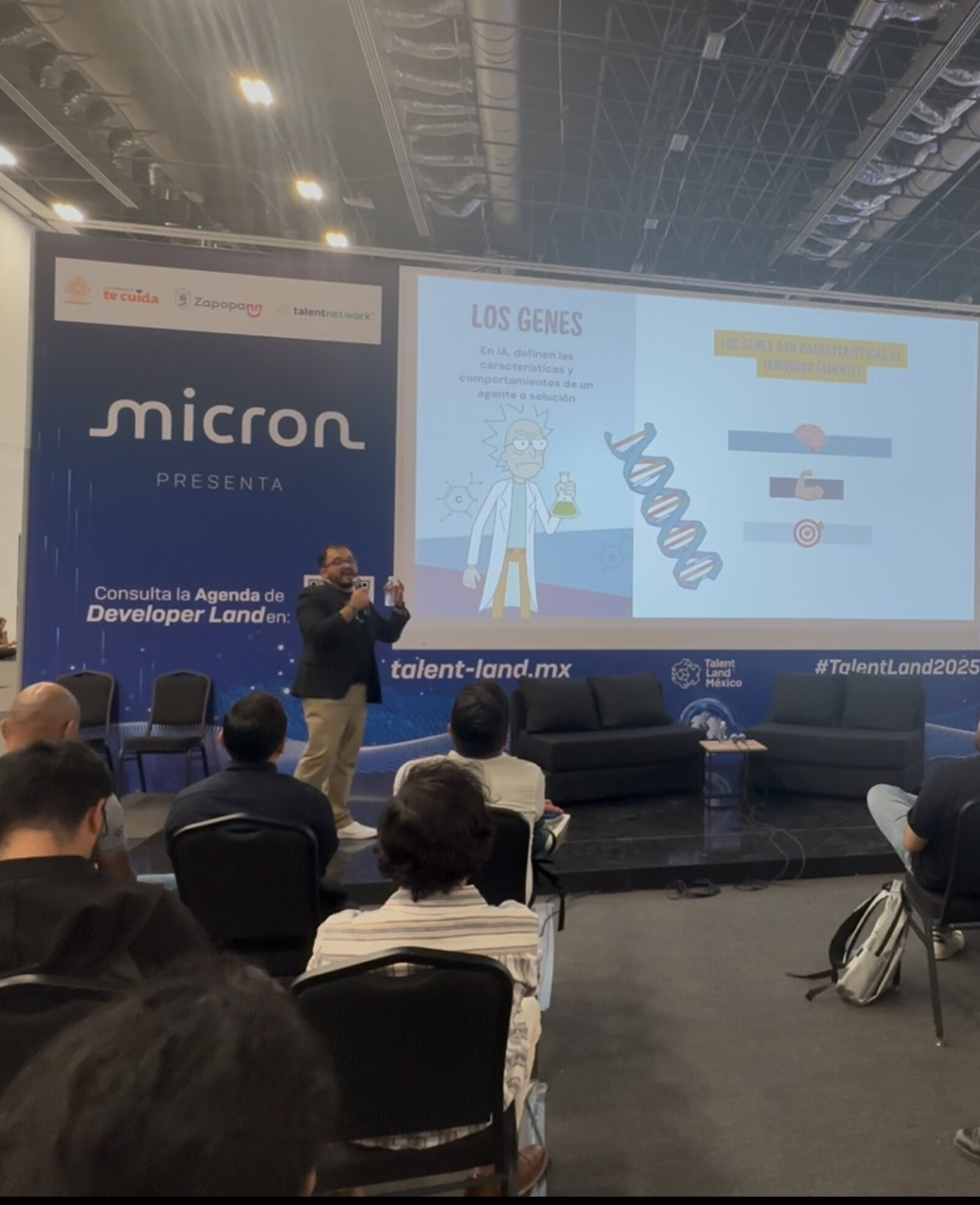 John Olven presenting Genetics in the Age of AI on the Developer Land stage at Talent Land 2025