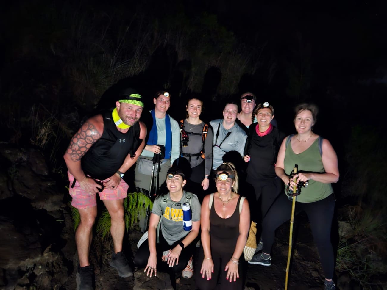 A Travsessed group beginning a Mount Batur adventure by headlamp before sunrise