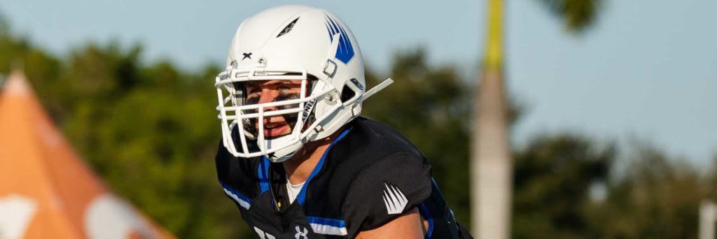 IMG football player wearing helmet