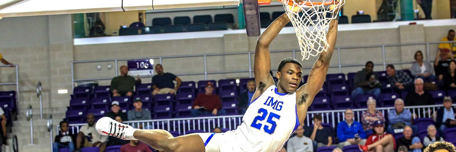 IMG male basketball player slam dunk