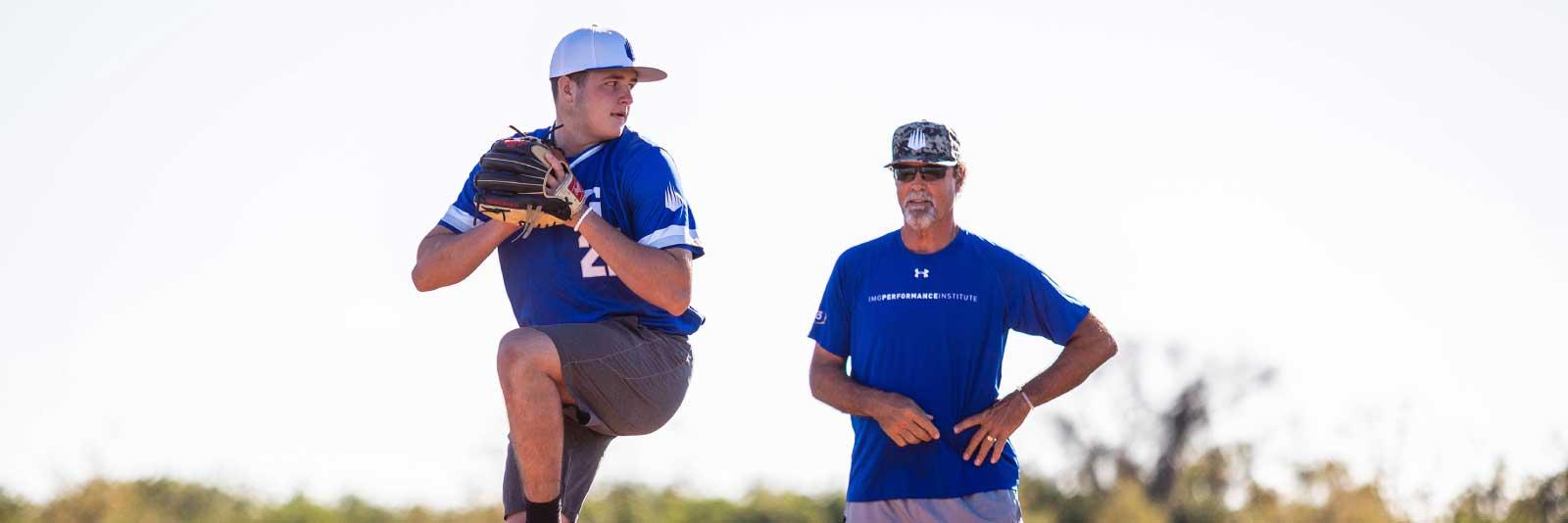 IMG baseball player pitching